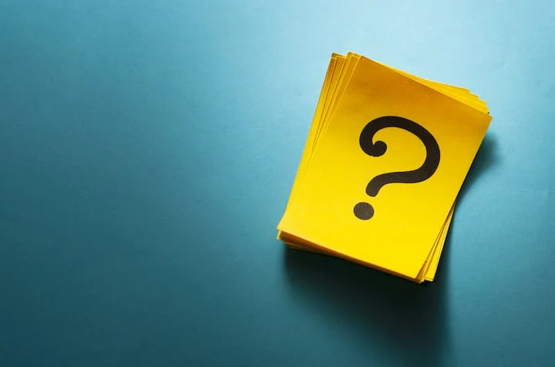 stack colorful yellow cards with question mark